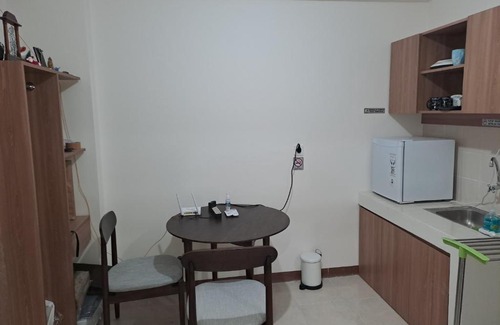 South Tangerang Apartment | Budget-Friendly Retreat at Loftvilles City with Pool Access