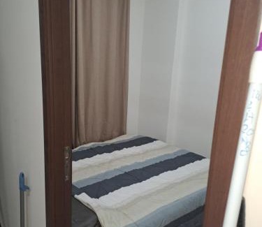 South Tangerang Apartment | Budget-Friendly Retreat at Loftvilles City with Pool Access