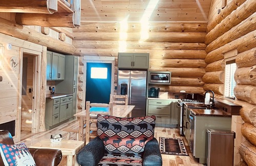Levering Cabin | Cozy Log Cabin Minutes from Lake Michigan with Pool Access