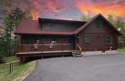 St Germain House | Secluded Log Cabin Retreat on Serene Lakefront Property