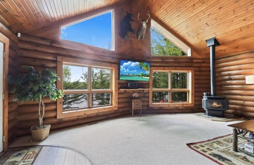 St Germain House | Secluded Log Cabin Retreat on Serene Lakefront Property