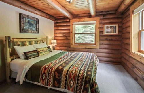 St Germain House | Secluded Log Cabin Retreat on Serene Lakefront Property