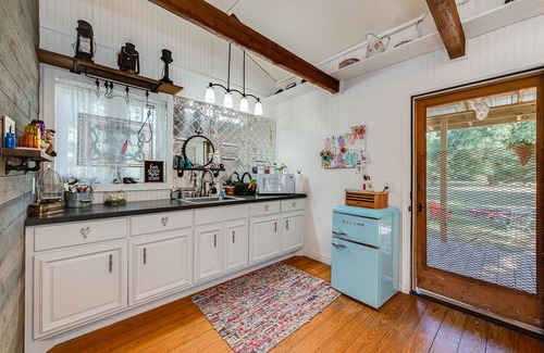 Montgomery Cabin | Cozy Log Cabin Tiny House with Ocean and Lake Views