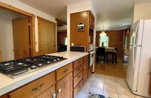 Riverside Estates Cabin | Cozy Log Cabin with Fire Pit, Hot Tub & Top-Rated Comfort