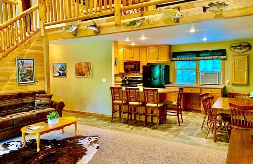 Lansing Cabin | Cozy Log Cabin with Hot Tub & Pool, Rated 9.8 by Guests