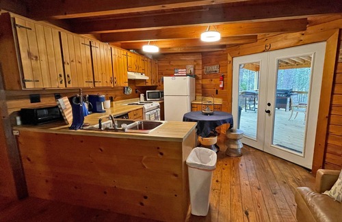 McCormick Cabin | Lakefront Log Cabin with Deck & Dock - Rated 9/10 by Guests