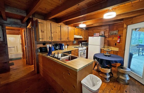 McCormick Cabin | Lakefront Log Cabin with Deck & Dock - Rated 9/10 by Guests