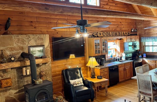 Livingston County Cabin | Log cabin with walkout basement and loft located on Ohio River’s edge.