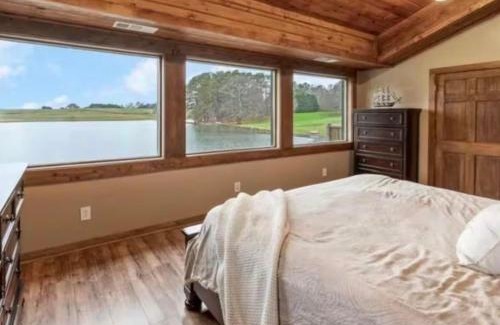 Bowdon Junction House | Log Castle and a spring-fed lake