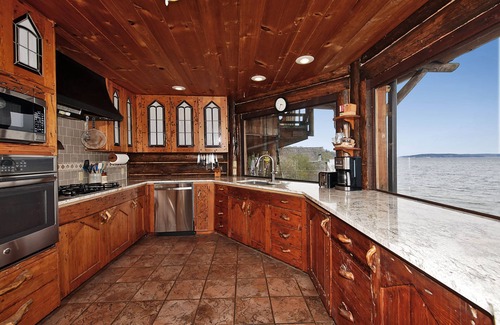 Langley House | Log Castle - Beachfront Retreat with Scenic Mountain Views