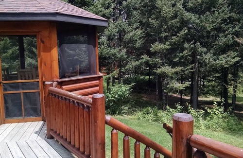Land O Lakes Ski Chalet | Scenic Log Chalet Lodge with Lakeside Deck and Amenities