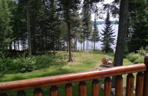 Land O Lakes Ski Chalet | Scenic Log Chalet Lodge with Lakeside Deck and Amenities
