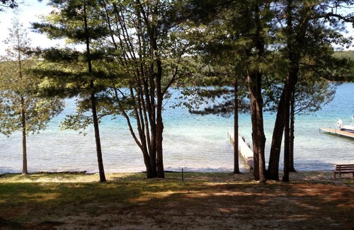 Kalkaska House | Experience Log Cottage on Blue Lake with Private Beach Access