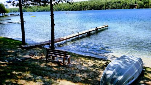 Kalkaska House | Experience Log Cottage on Blue Lake with Private Beach Access