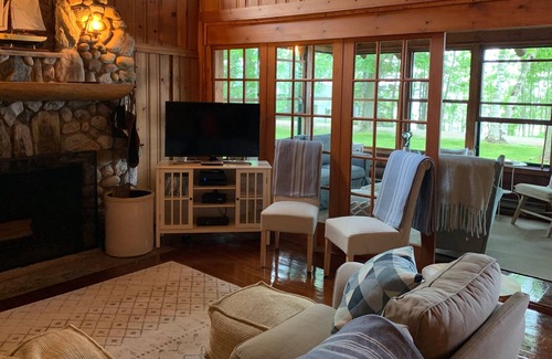 Northport Cottage | Charming Log Cottage with Beach Access & Downtown Proximity