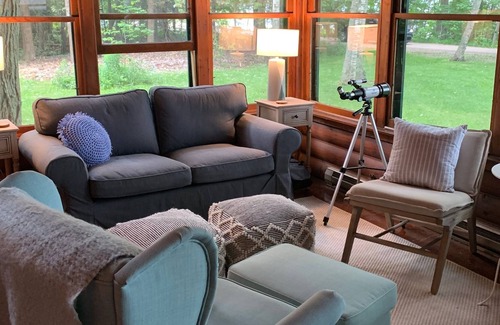 Northport Cottage | Charming Log Cottage with Beach Access & Downtown Proximity