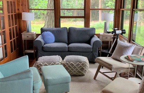 Northport Cottage | Charming Log Cottage with Beach Access & Downtown Proximity