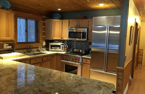 Necedah House | Discover a Modern Log Home with Oceanfront Serenity
