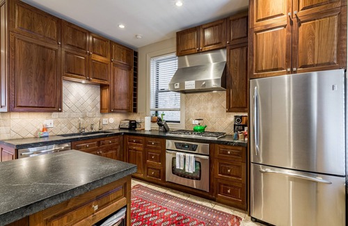 Logan Square Apartment | Prime Location with Kitchen Access - Guest Rated 9.8/10!