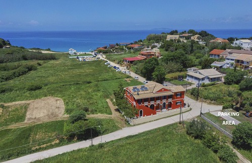 Peroulades Apartment | Idyllic Logas Beach Studio 8 with Oceanfront Amenities