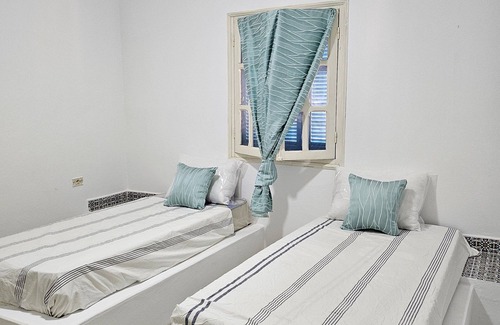 Mezraia Apartment | Renovated 2-Bedroom Stay Near the Beach, Family-Friendly