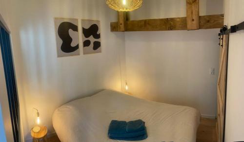 Mimizan Apartment | Logement entièrement rénové entre le bourg et les plages océanes, calme et confort climatisé, terrasse spacieuse, WIFI, parking gratuit, linge et ménage compris, proche des commerces ouverts toute l'année