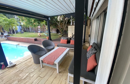 Les Abymes Condo | Inviting Stay in the Heart of the Island with Pool Access