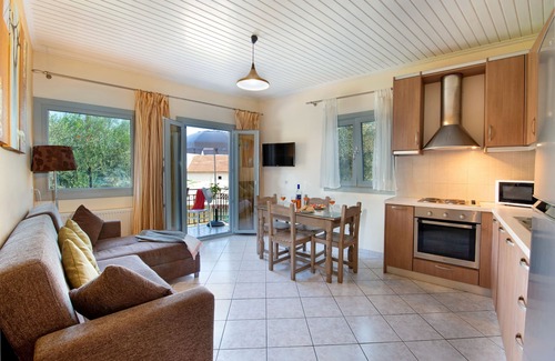 Longos Apartment | Loggos Haven: Upper-Floor Retreat with Ocean Views