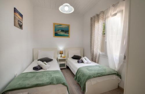 Koutsi Villa | Relaxing Loggos Seaview Cottage with Private Pool Awaits