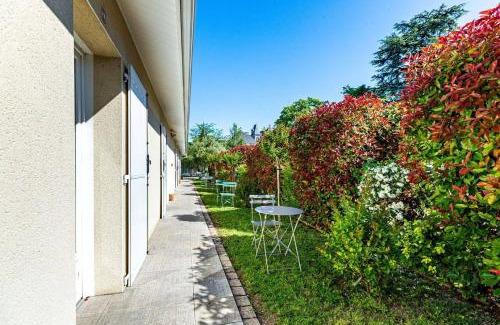 Cognac Hotel | Discover Logis Hôtel L'Oliveraie: Pool, Dining & Pets Welcome