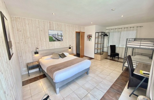 Cognac Hotel | Discover L'Oliveraie: Family-Friendly Stay with Pool & Dining