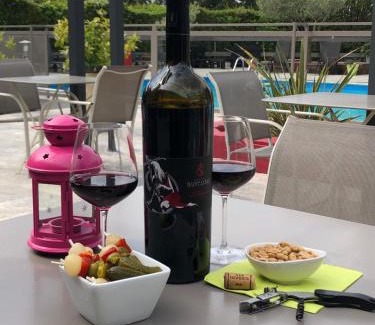 Caissargues Hotel | Inviting Logis Hôtel Restaurant Les Aubuns with Pool & Ocean Views