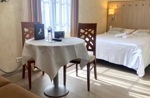 Vouille Hotel | Discover Logis Le Cheval Blanc et Clovis: Family-Friendly Retreat