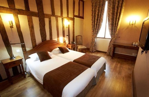 Ligny-le-Chatel Hotel | Explore Logis Relais Saint Vincent: Spa & Family-Friendly Stay