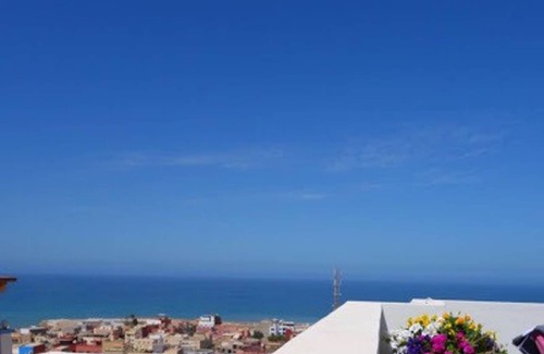 Tamrhakht Apartment | Sunny Oceanfront Retreat with Terrace and Pet-Friendly Amenities