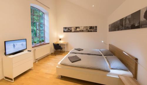 Stadtlohn Apartment | Indulge at LokoMotel: Top-Rated Family-Friendly Getaway