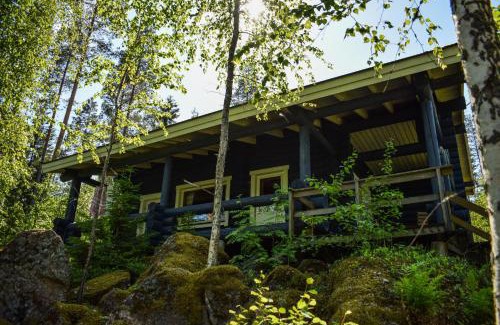 Puumala Ski Chalet | Inviting Loma-Autio Aamurusko with Oceanfront Amenities