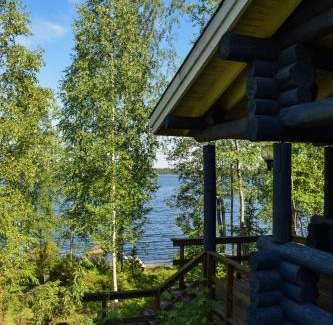 Puumala Ski Chalet | Inviting Loma-Autio Aamurusko with Oceanfront Amenities