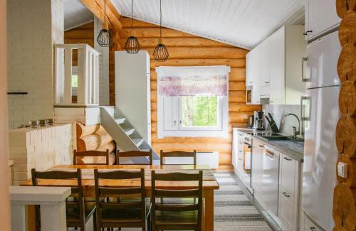 Puumala Ski Chalet | Inviting Loma-Autio Aamurusko with Oceanfront Amenities