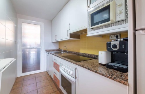 Vera Apartment | Beachfront Retreat at Lomas del Mar V by Interhome