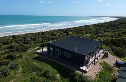 Waterhouse House | Unforgettable Long Beach Break: Oceanfront Family Retreat