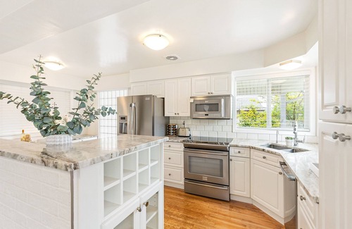 City Centre House | Spacious 5-Bedroom Home with Pool, Near Downtown Adventures
