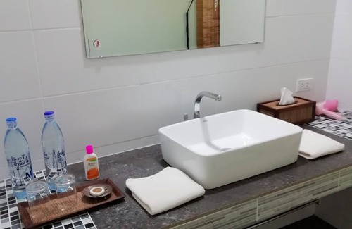 Khua Mung Hotel | Inviting Longan Tree: Poolside Comfort and Family-Friendly Stay