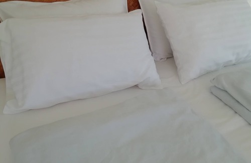 Khua Mung Hotel | Inviting Longan Tree: Poolside Comfort and Family-Friendly Stay
