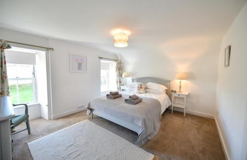 Whithorn House | Inviting Longhill Farmhouse: 4-Star Stay with Breakfast & Pets