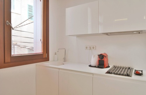 La Llotja-Born Apartment | Discover Lonja Suites: Oceanfront Getaway with Spa & Pool