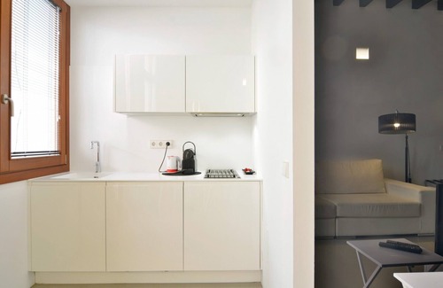 La Llotja-Born Apartment | Discover Lonja Suites: Oceanfront Getaway with Spa & Pool