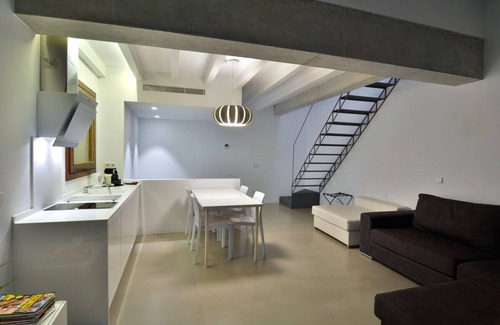 La Llotja-Born Apartment | Experience Comfort at Lonja Suites with Oceanfront Bliss