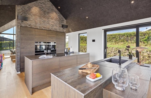 Hejlsminde Strand House | Discover Breathtaking Ocean Views and Relaxing Outdoor Spa