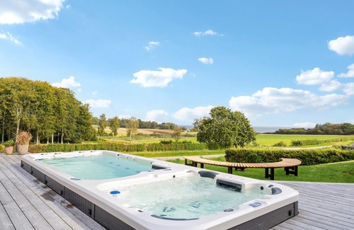 Hejlsminde Strand House | Discover Breathtaking Ocean Views and Relaxing Outdoor Spa